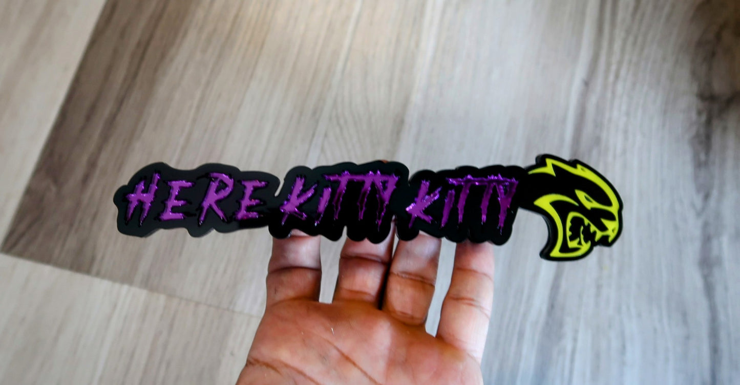 Here Kitty Kitty car badge