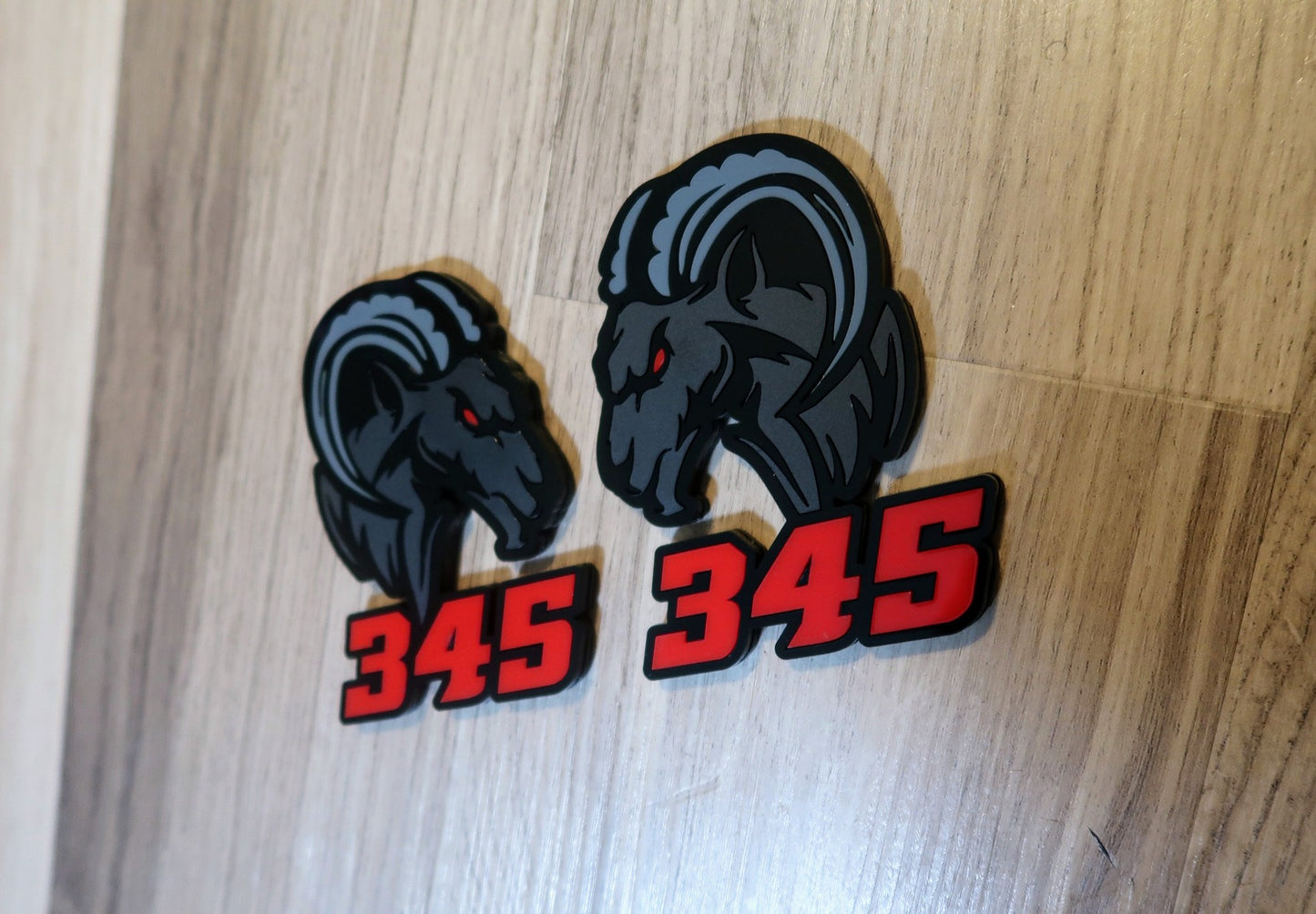 345,392 Agressive Ram Fender badges. Includes 2.