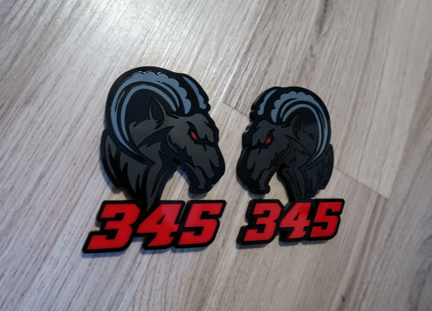 345,392 Agressive Ram Fender badges. Includes 2.