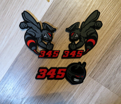 392 or 345 fender badges. Includes 2.