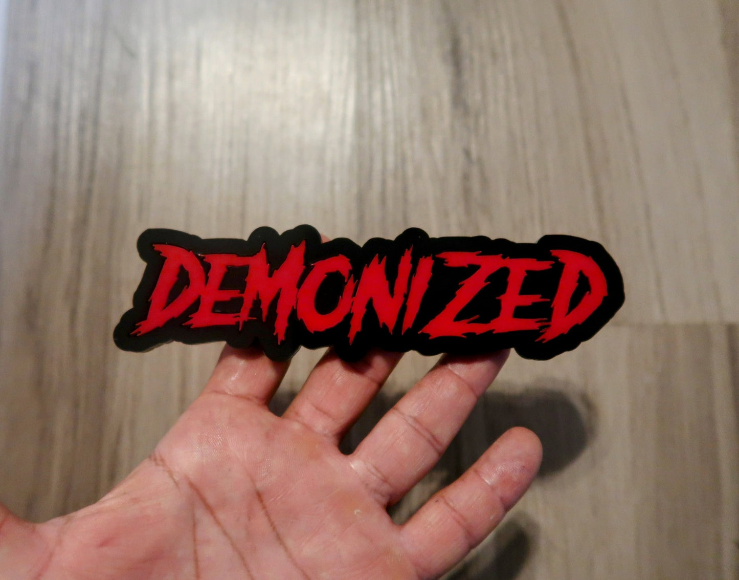 Demonized Car Badge