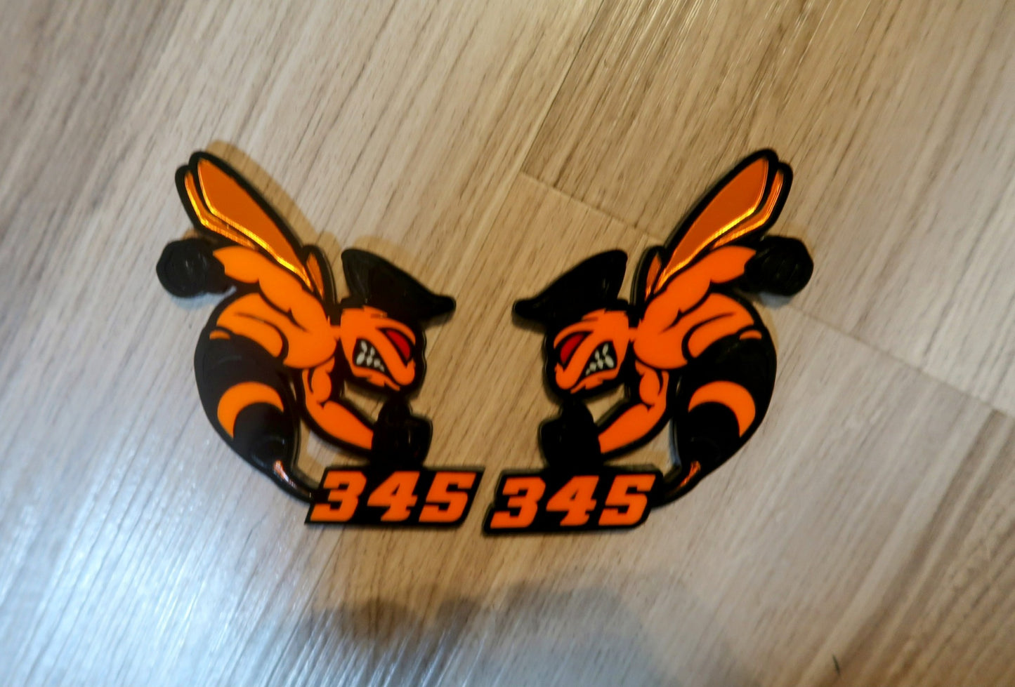 392 or 345 fender badges. Includes 2.