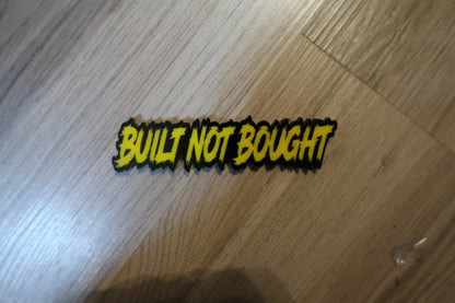 Built not bought car badge