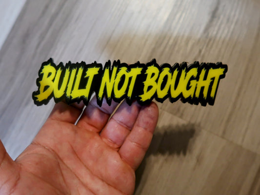 Built not bought car badge