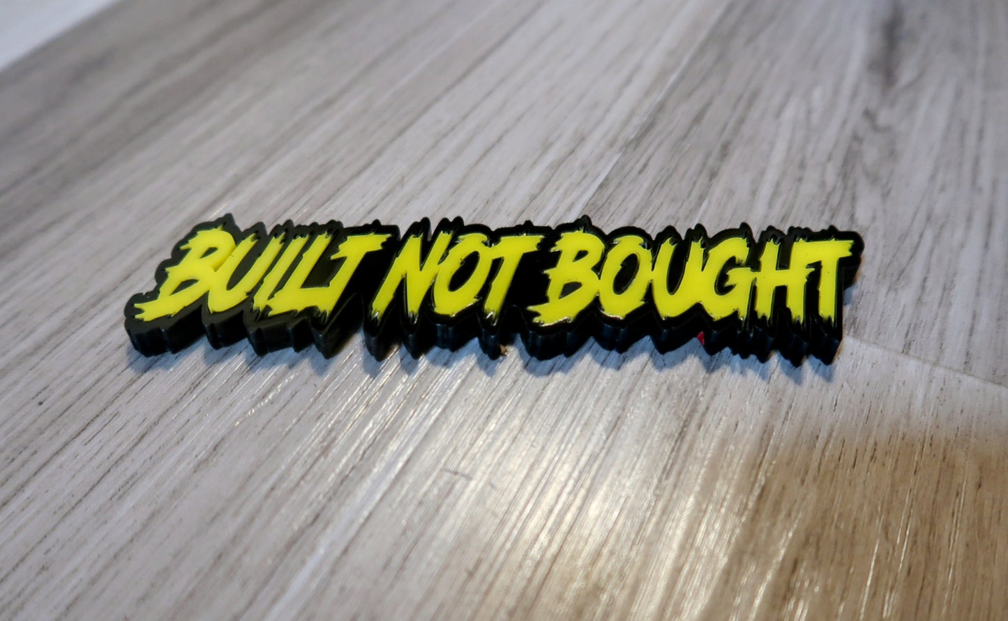 Built not bought car badge