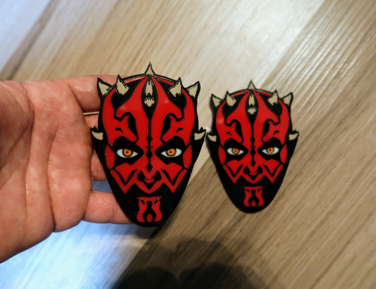 Darth Fender badges. Includes 2.