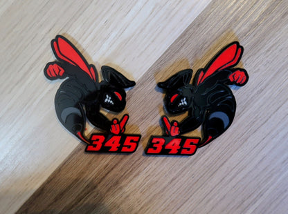 392 or 345 fender badges. Includes 2.