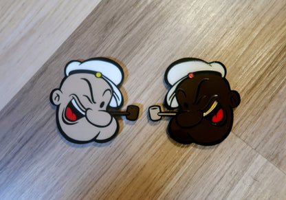 Inspired Popeye badges. Includes 2.