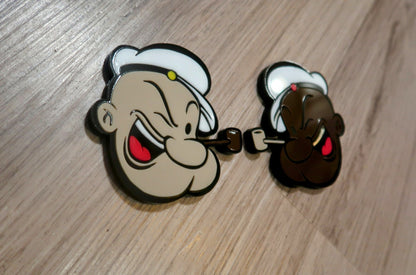 Inspired Popeye badges. Includes 2.