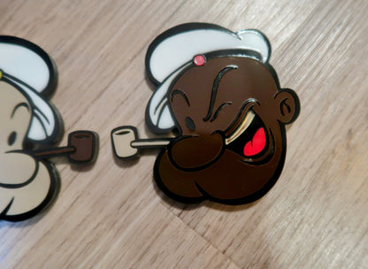 Inspired Popeye badges. Includes 2.