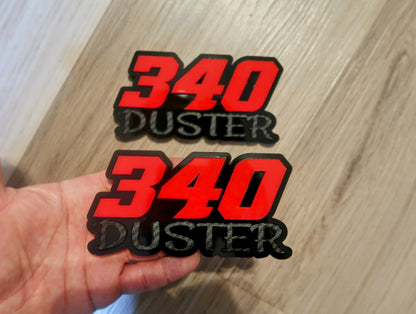 340 Duster fender badges. Includes 2.