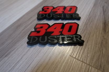 340 Duster fender badges. Includes 2.