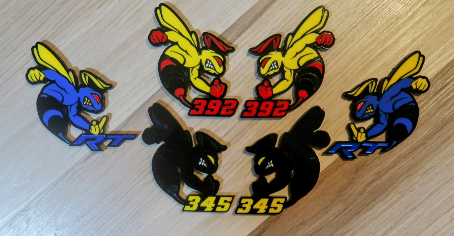 392 or 345 fender badges. Includes 2.