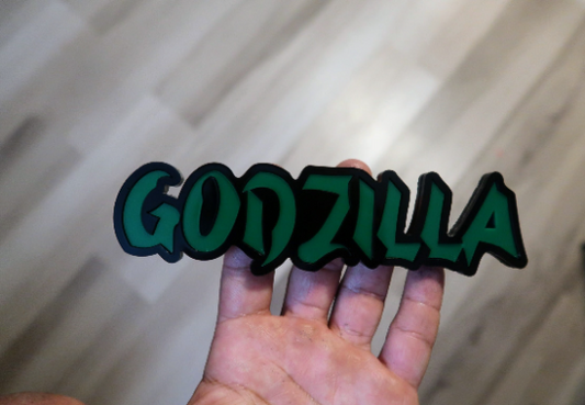 Godzilla car badge
