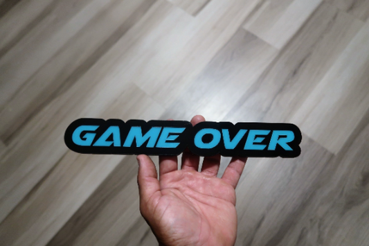 Game Over car badge