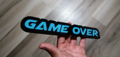 Game Over car badge