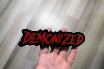 Demonized Car Badge