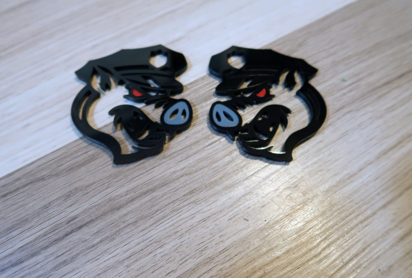 Pig fender badges. Includes 2