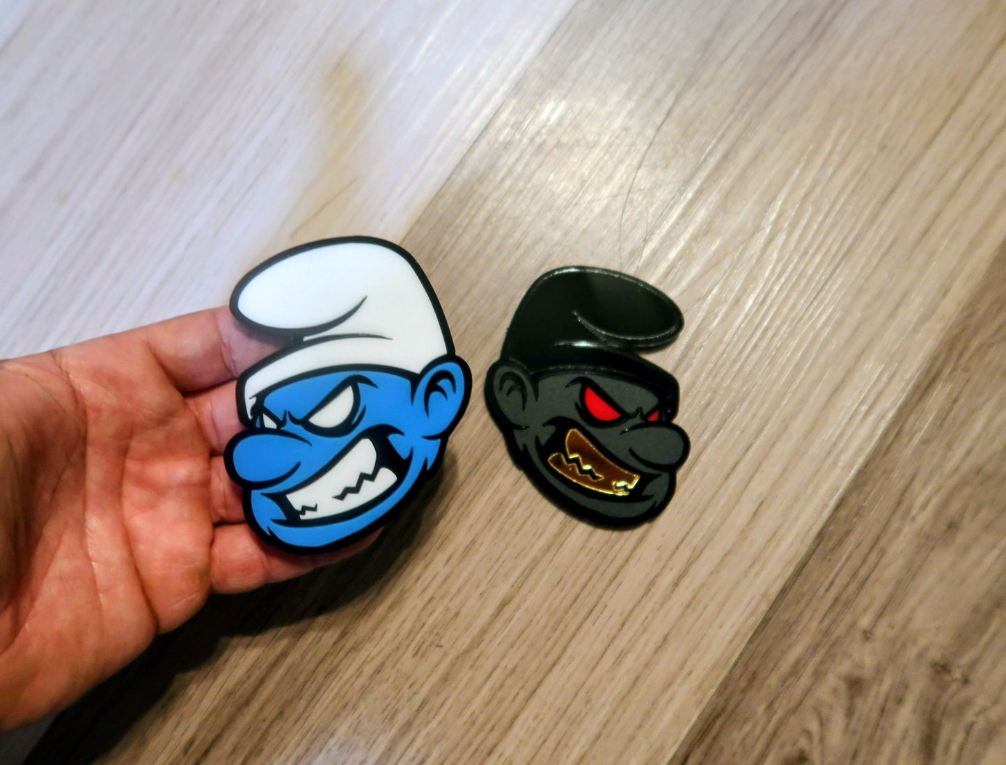 Possessed Smurf badges. Includes 2
