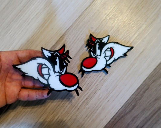 Sylvester Custom badges. Includes 2.