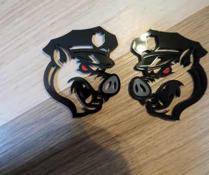 Pig fender badges. Includes 2