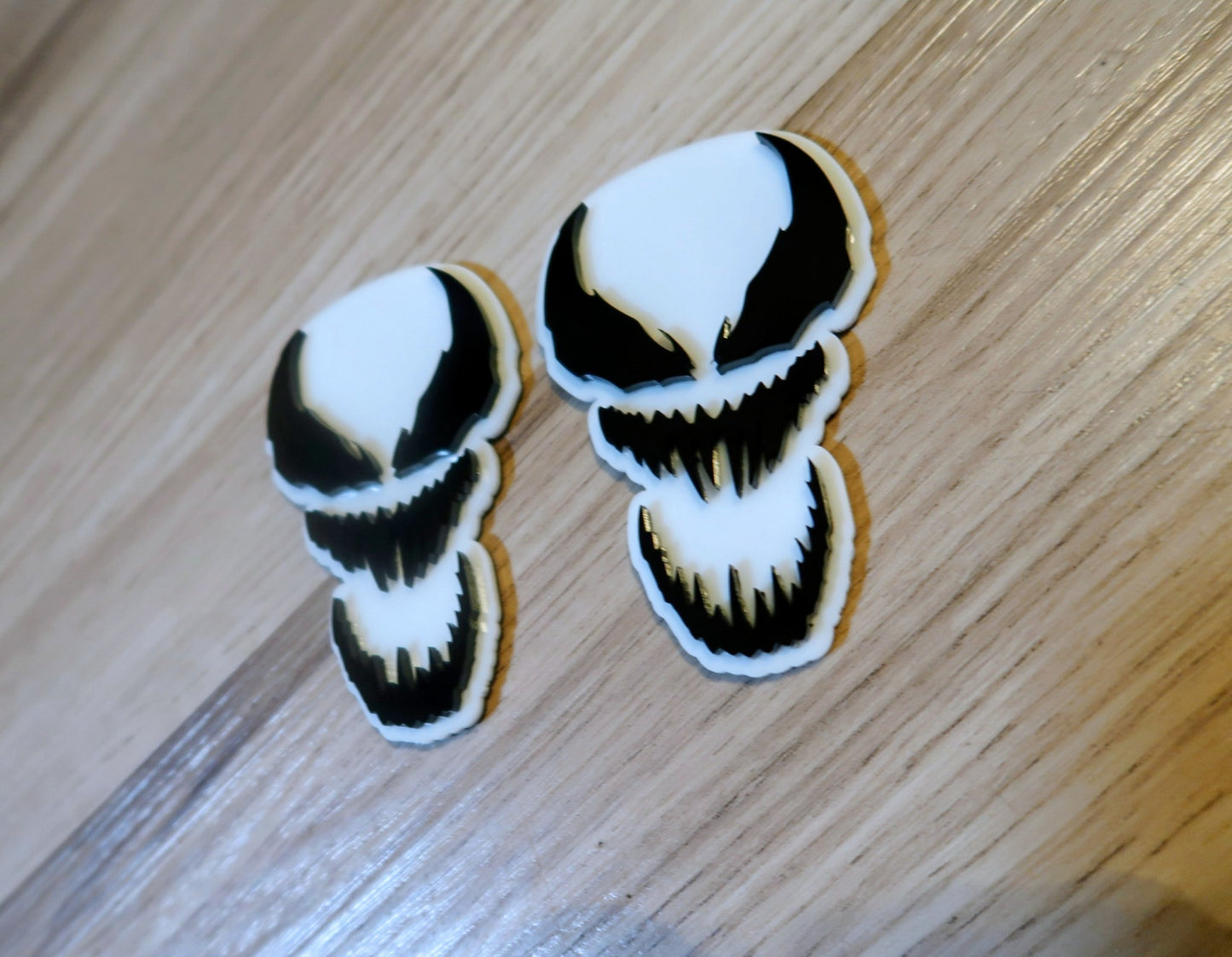 Inspired Carnage and Venom car badges. Includes 2.