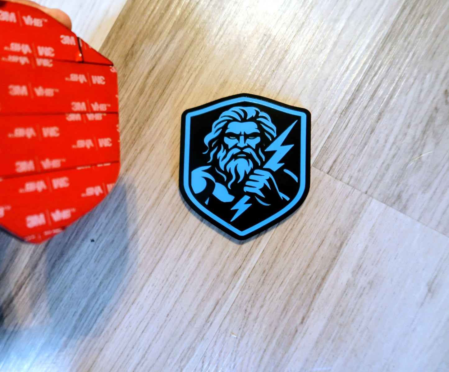 Zeus badges. Includes 2