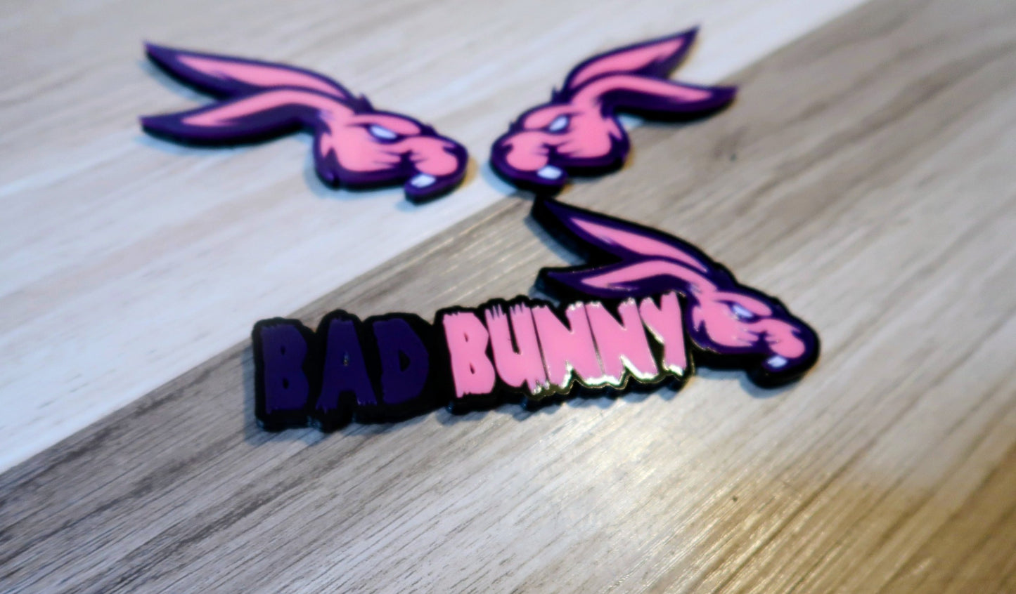 Bad Bunny. Includes 3 badges