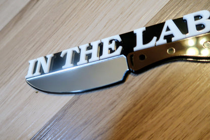 In The Lab badge. Includes 1