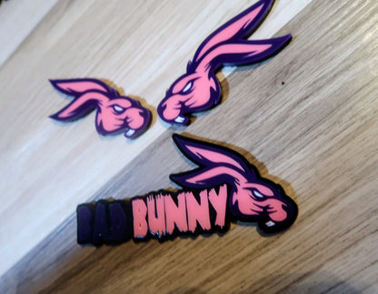 Bad Bunny. Includes 3 badges