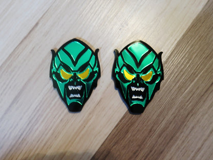 Inspired Green Goblin badges. Includes 2.