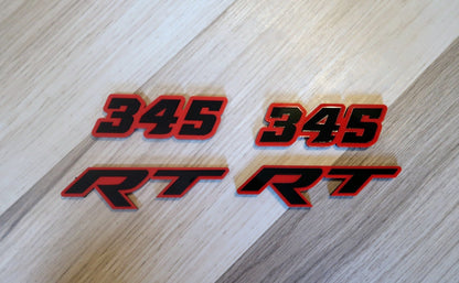 Racetrack badges. Includes 2.