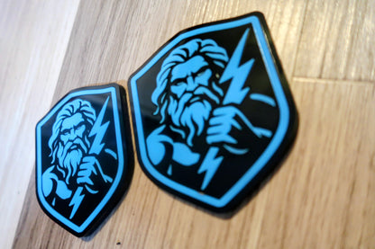 Zeus badges. Includes 2