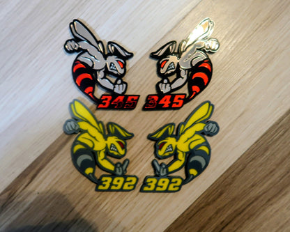 392 or 345 fender badges. Includes 2.