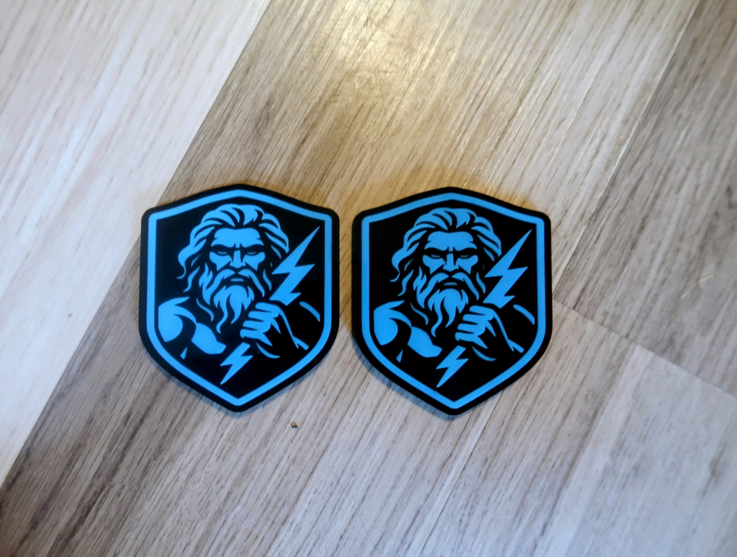 Zeus badges. Includes 2