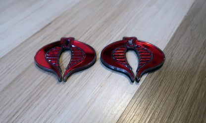 G.I. Joe Cobra badges. Includes 2