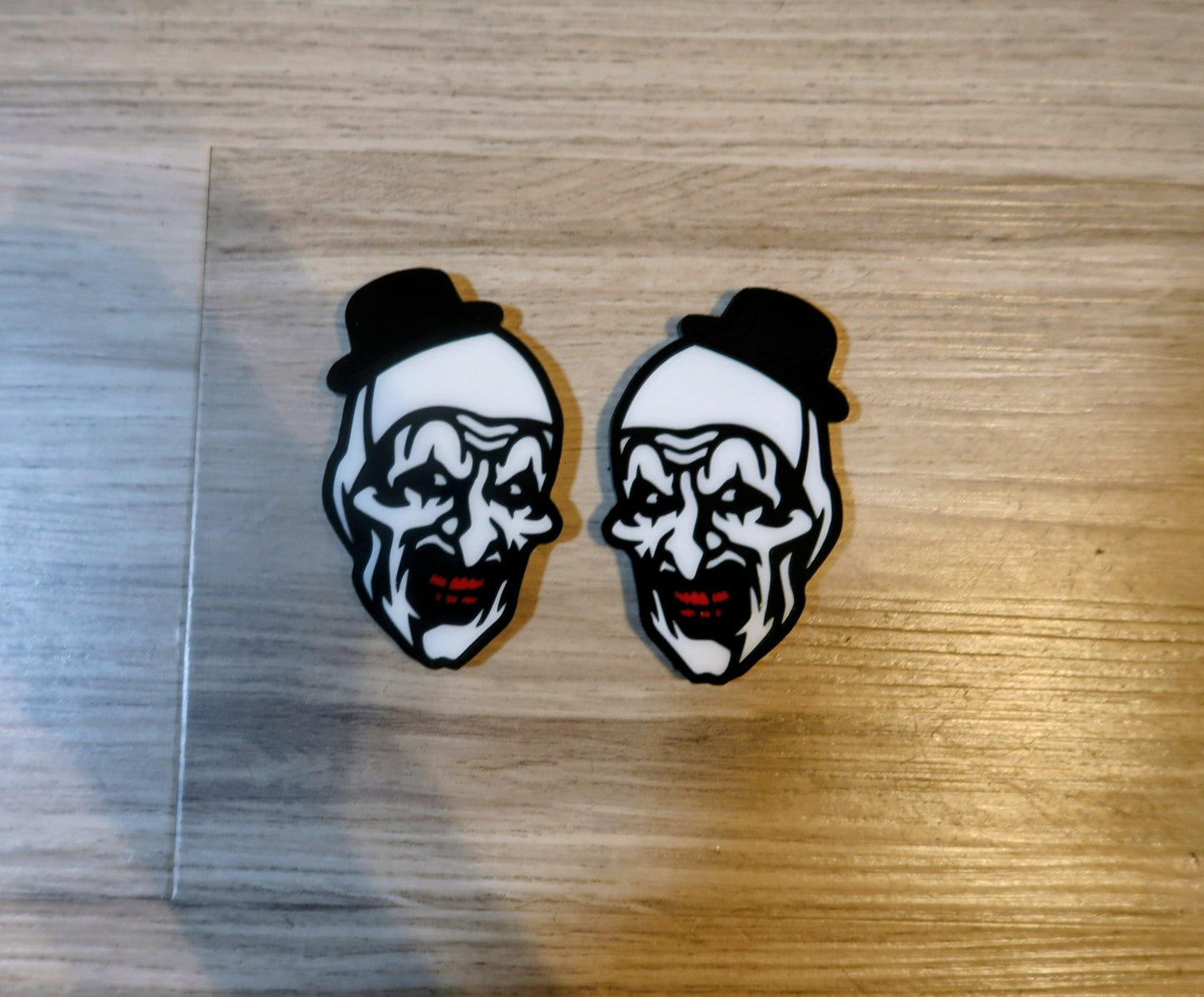 Terrifier badges. Includes 2