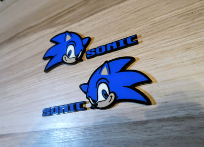 Sonic head and text badge. Includes all 4.