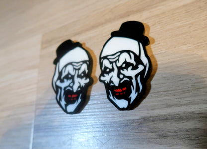 Terrifier badges. Includes 2