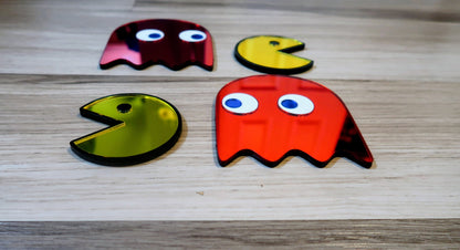 Pac-Man and Ghost badges. Includes 4