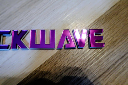 Shockwave text badge. Individual letters with outline.
