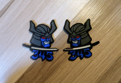 Samurai 345,392, 426 fender badges. Includes 2.