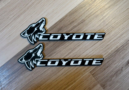 Coyote badges. Includes 2.