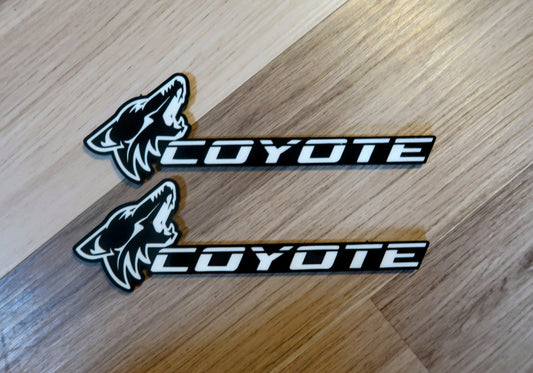 Coyote badges. Includes 2.
