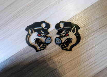 Pig fender badges. Includes 2