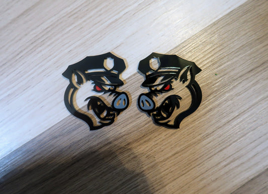 Pig fender badges. Includes 2