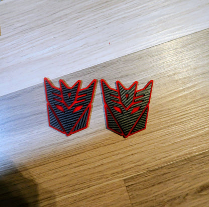 Decepticon badges. Includes 2