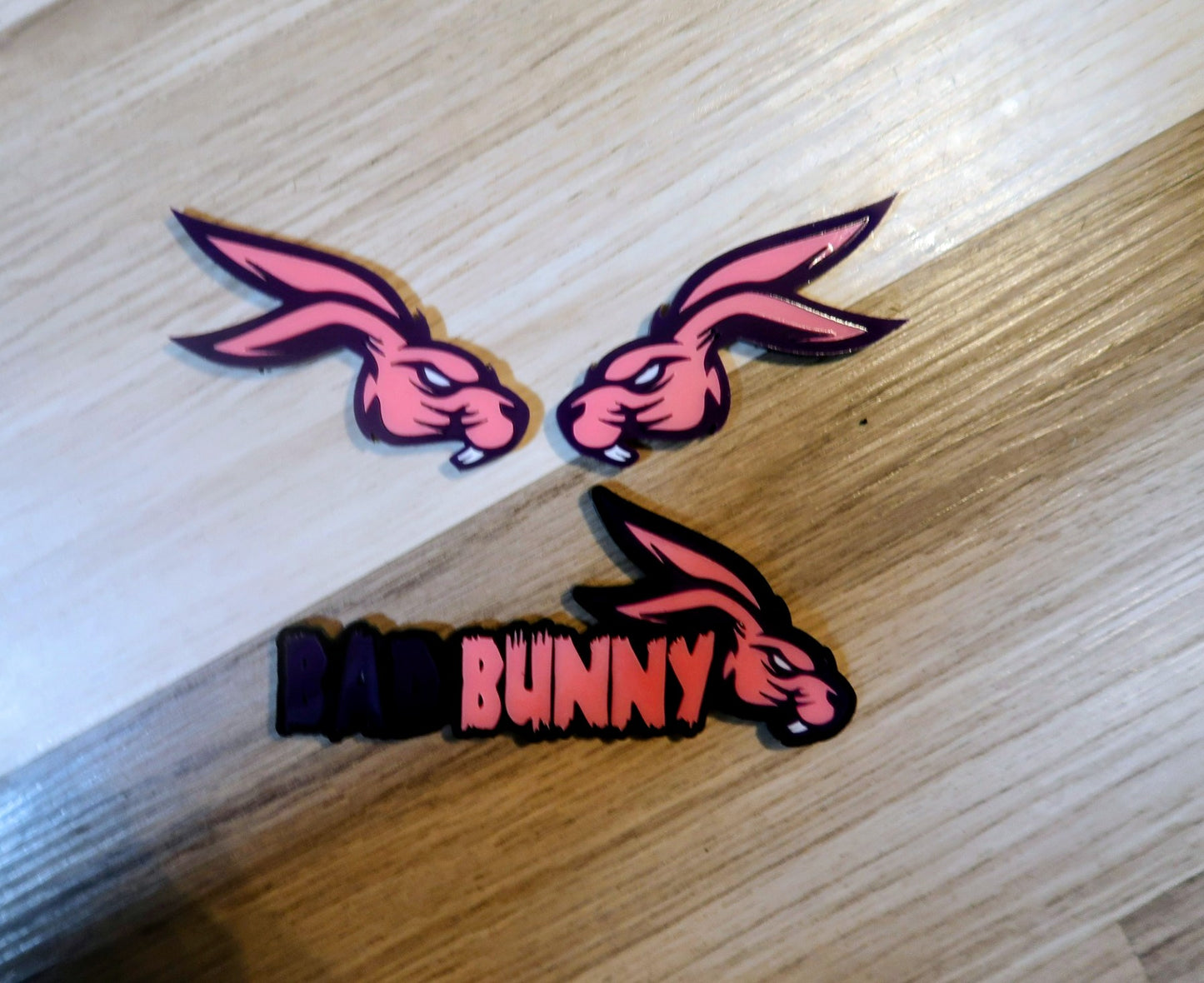 Bad Bunny. Includes 3 badges