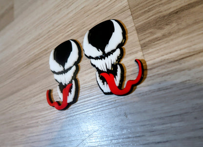 Venom with Tongue badges. Includes 2