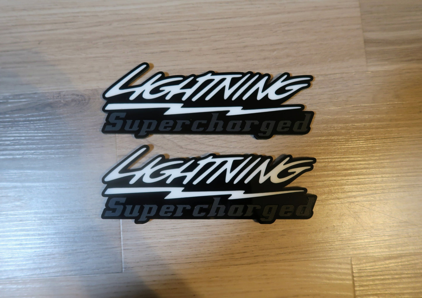 Supercharged Lightning badges. Included 2.